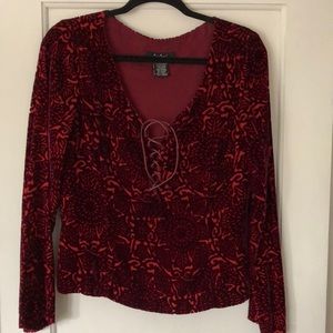 ECI NY. Red burnout top. Side zip. Rayon /silk. Size medium. Long sleeves. NWOT.